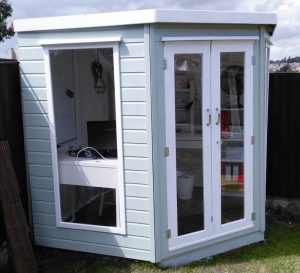 Summer house shed office soft light green and white
